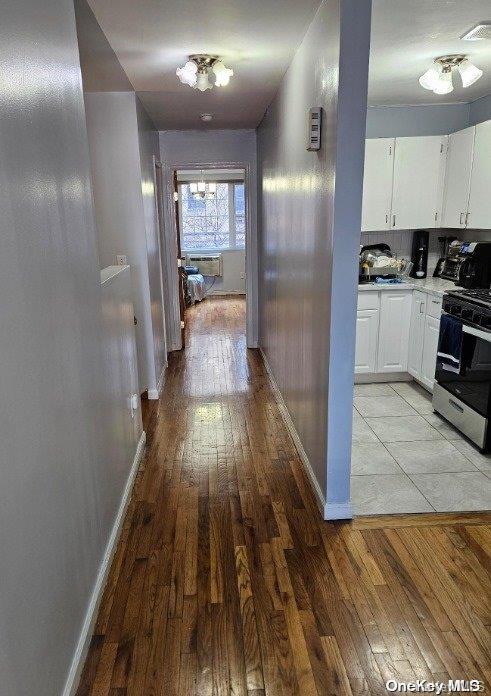 hallway featuring light hardwood / wood-style floors