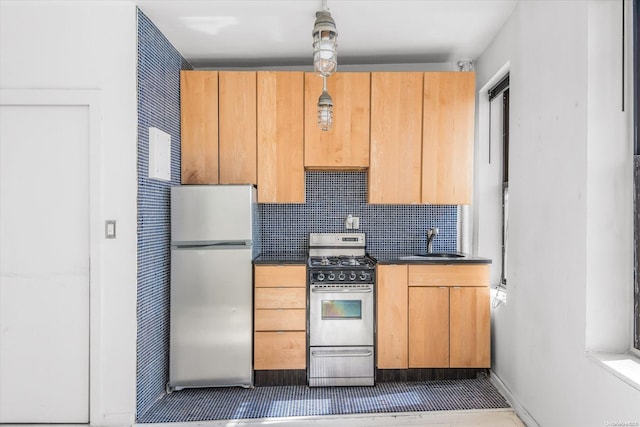 kitchen featuring backsplash, sink, and stainless steel appliances