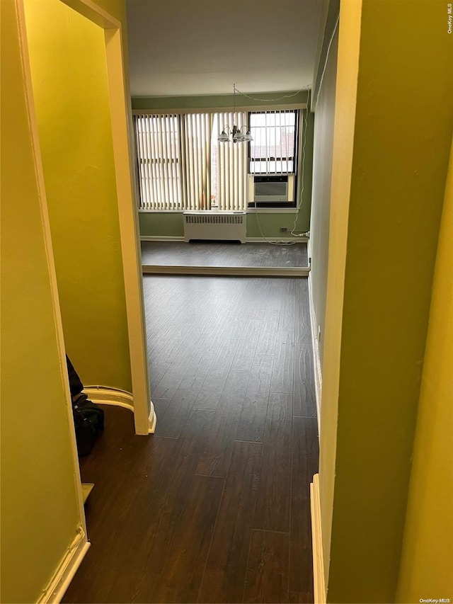 hall with dark hardwood / wood-style floors