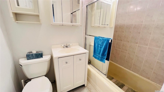 full bathroom with vanity, enclosed tub / shower combo, and toilet