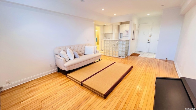 living room featuring light wood-type flooring