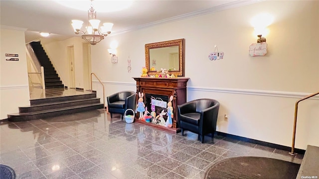 sitting room featuring crown molding and a notable chandelier