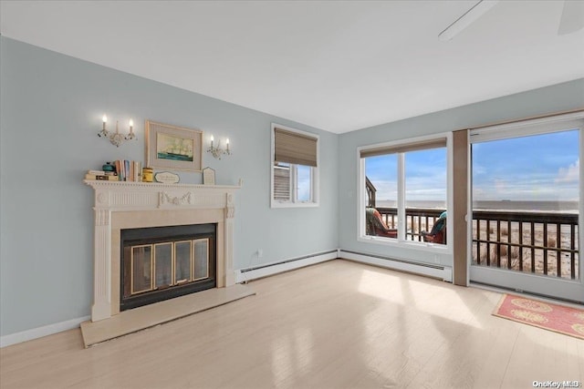 unfurnished living room with light hardwood / wood-style floors