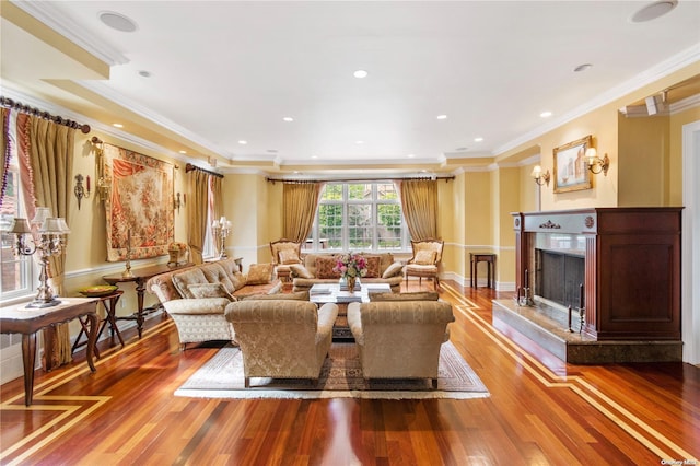 living room featuring ornamental molding and hardwood / wood-style flooring