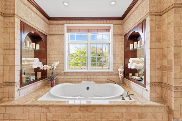 bathroom featuring a relaxing tiled tub and crown molding