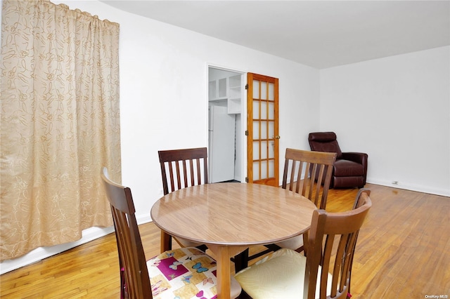 dining room featuring hardwood / wood-style floors