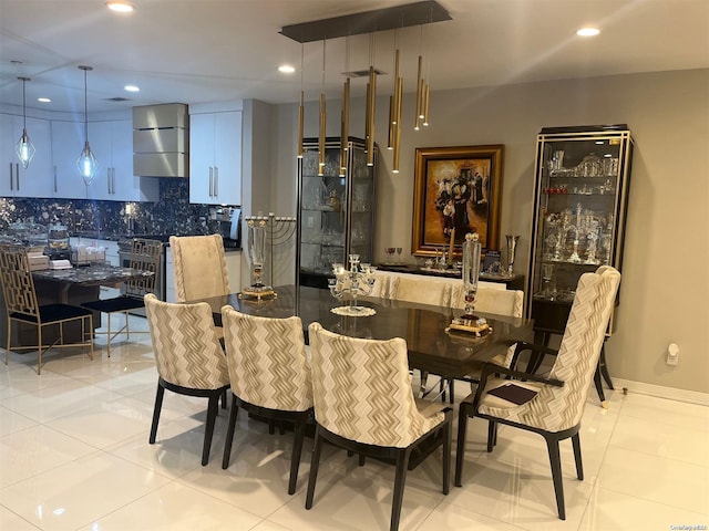 dining area featuring light tile patterned floors