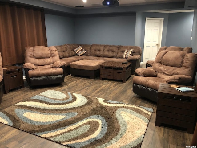 living room with wood finished floors and visible vents