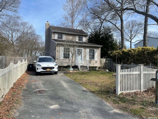 view of front of home with a front yard