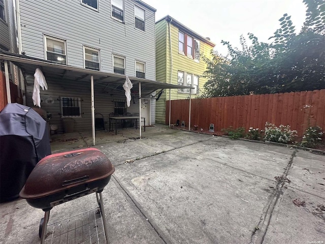 view of patio featuring a grill