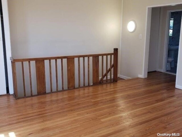 spare room featuring light hardwood / wood-style flooring