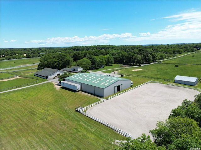 birds eye view of property featuring a rural view