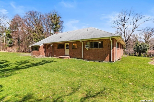 547 Asharoken Ave, Northport, NY 11768 - rear view of property featuring brick siding, a lawn, and a chimney