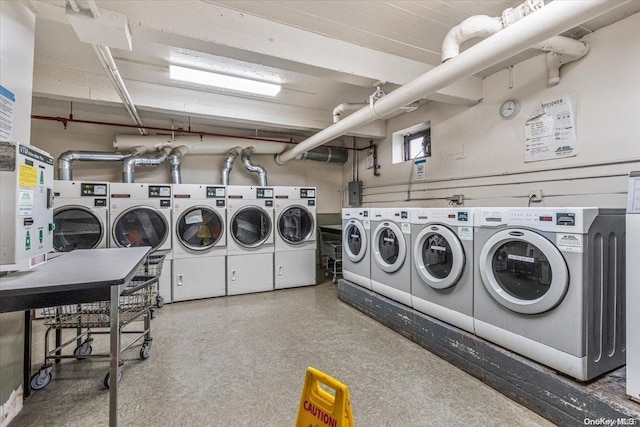 washroom with washer and dryer