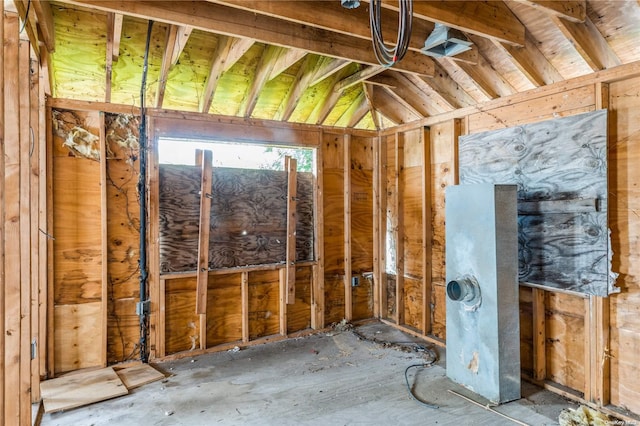 miscellaneous room featuring lofted ceiling