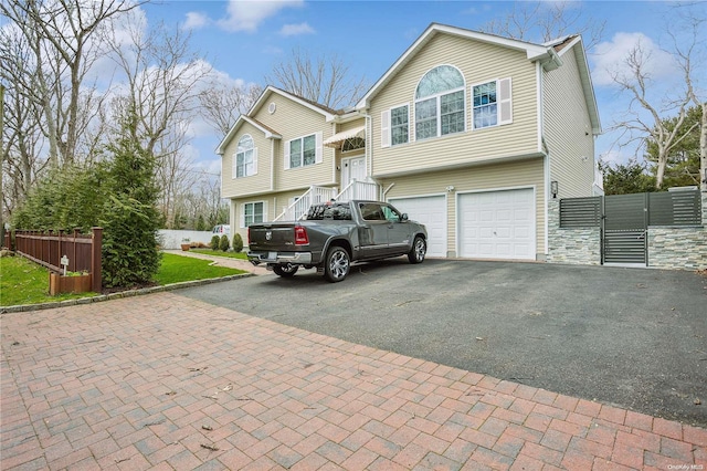 split foyer home featuring a garage