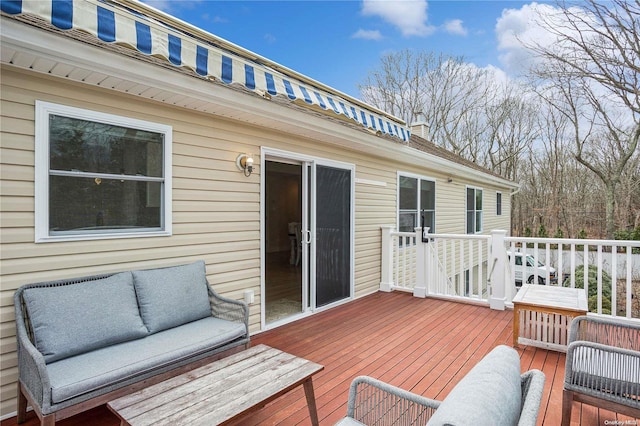 deck featuring outdoor lounge area