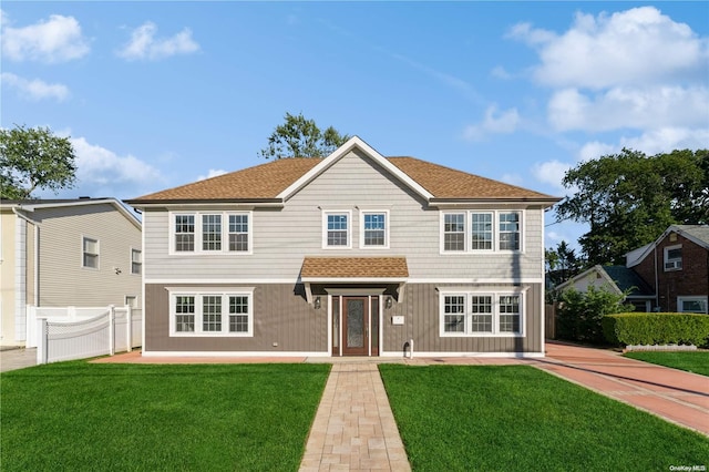 view of front facade with a front lawn