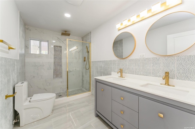 bathroom featuring vanity, toilet, tile walls, and walk in shower