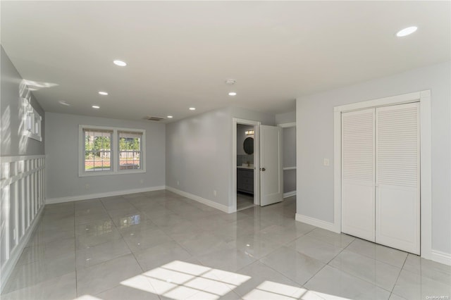 interior space featuring light tile patterned floors