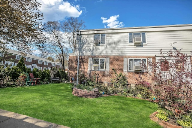 exterior space with a front lawn