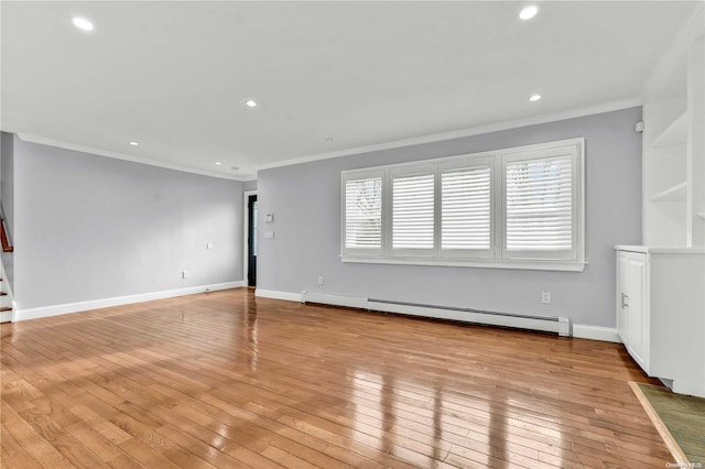 unfurnished living room with light hardwood / wood-style floors, crown molding, and baseboard heating