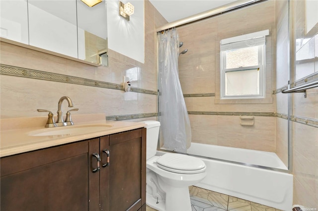 full bathroom with vanity, shower / bathtub combination with curtain, toilet, and tile walls