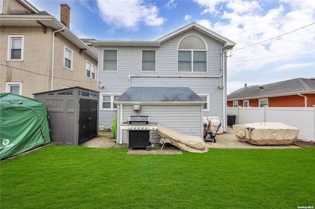 245 W Chester St W, Long Beach, NY 11561 - back of house featuring a hot tub and a patio