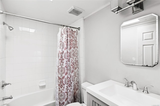 full bathroom featuring vanity, toilet, and shower / tub combo with curtain