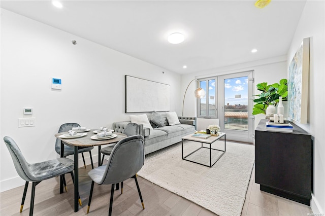 living room with light hardwood / wood-style floors