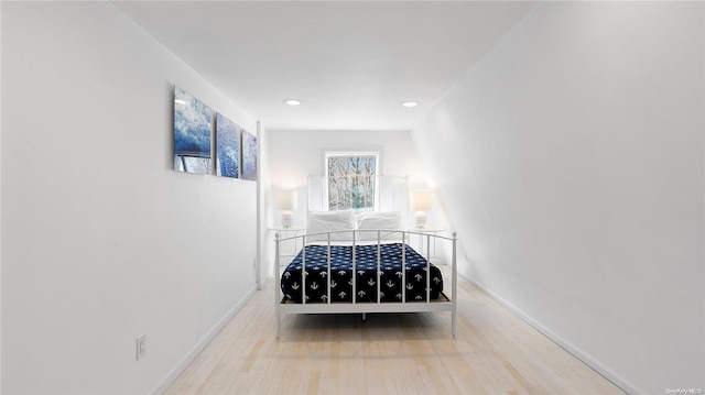 unfurnished bedroom featuring wood-type flooring