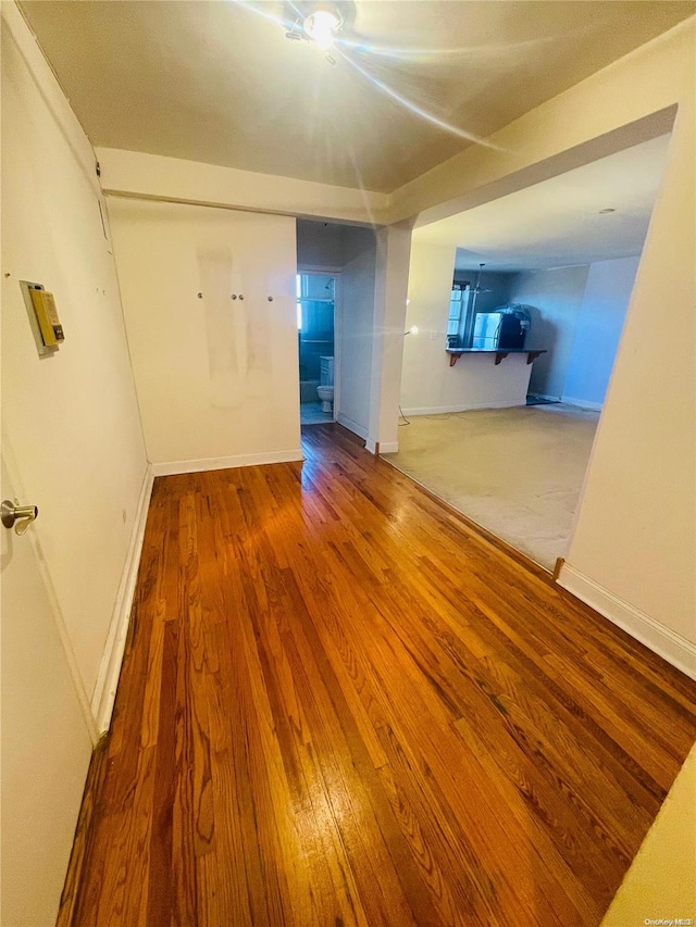 interior space with hardwood / wood-style flooring