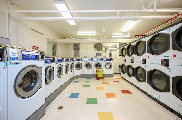 laundry room featuring washer and clothes dryer