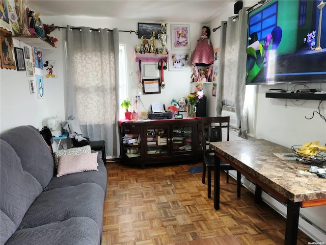 living room featuring parquet floors