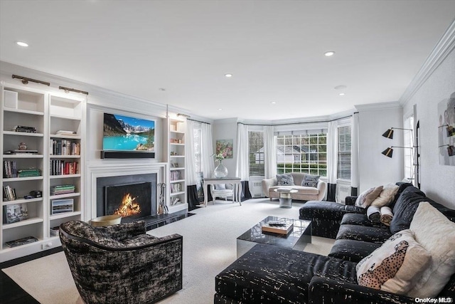 carpeted living room with crown molding