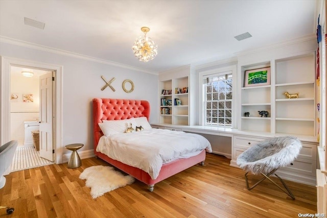 bedroom featuring ensuite bath, crown molding, and light hardwood / wood-style flooring