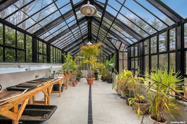 view of patio / terrace featuring glass enclosure