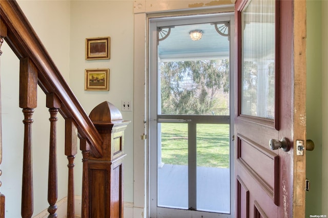 12115 Main Rd, East Marion, NY 11939 - foyer with plenty of natural light and stairs