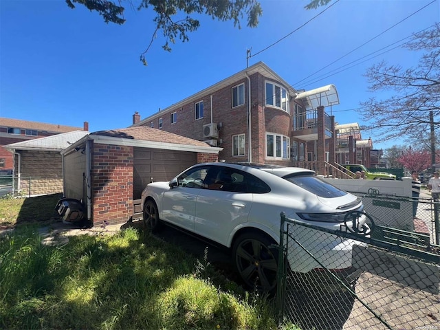 view of property exterior with a garage