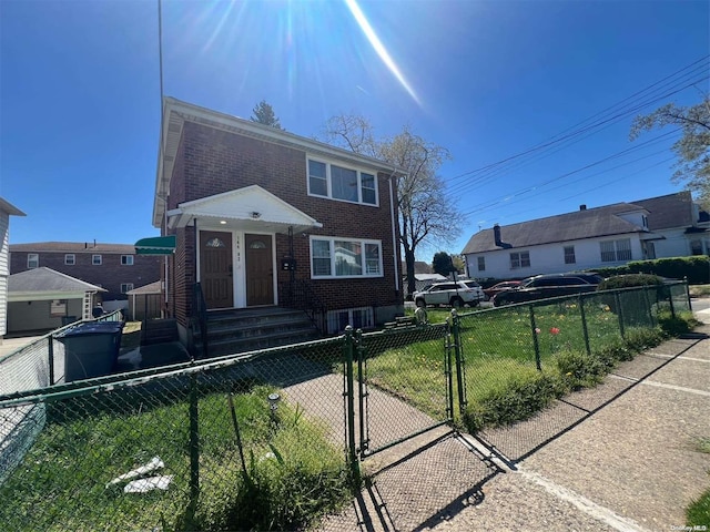 view of front of home with a front lawn