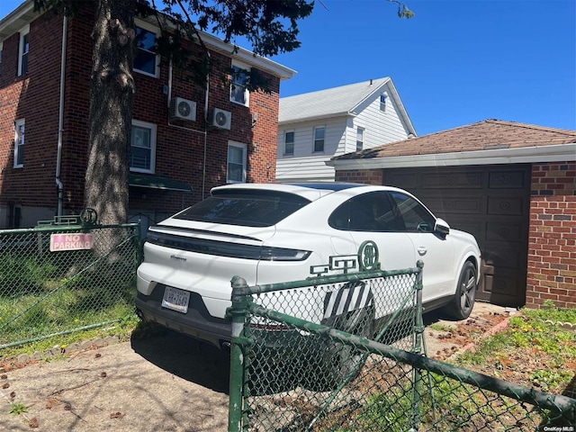 view of side of property featuring a garage