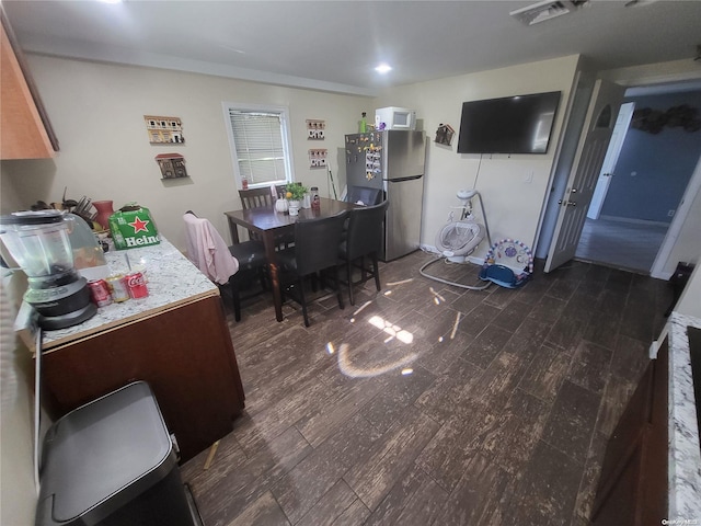 interior space with dark hardwood / wood-style flooring