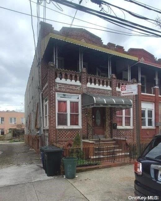 view of home's exterior featuring a balcony