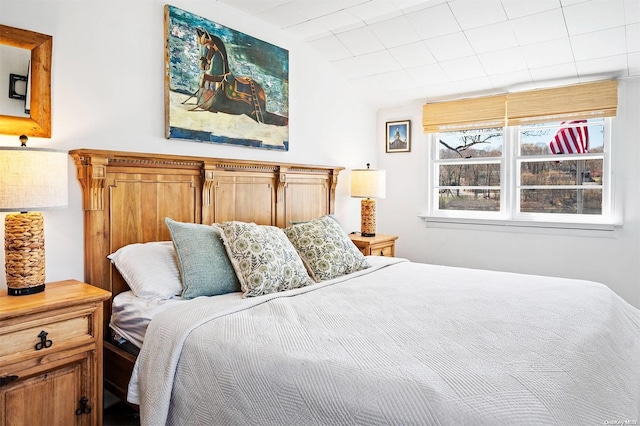 bedroom with lofted ceiling