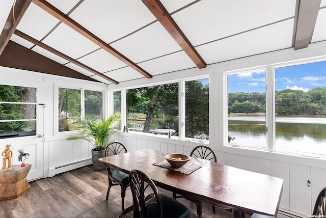 sunroom featuring a water view, lofted ceiling, and a baseboard heating unit