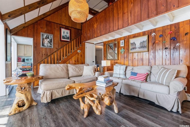 living room with hardwood / wood-style flooring, high vaulted ceiling, beamed ceiling, and wooden walls