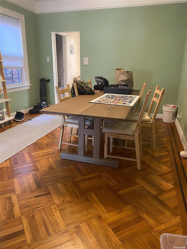 unfurnished dining area with parquet floors