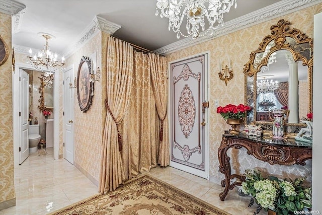 corridor with a notable chandelier and crown molding