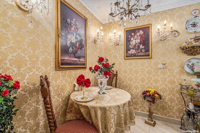 dining area featuring crown molding and a chandelier