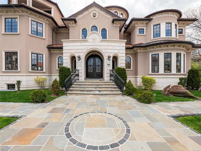 view of front facade featuring french doors